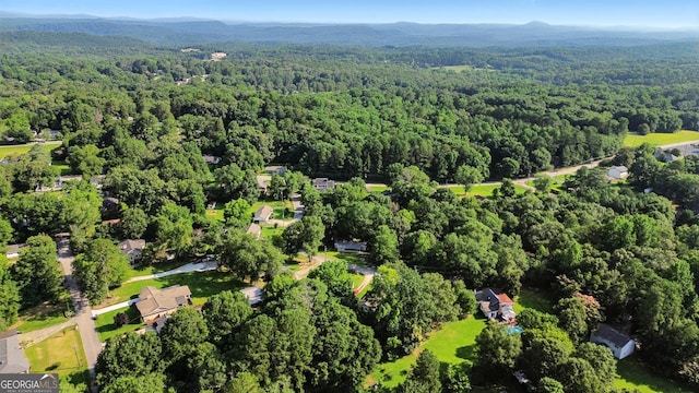 67 Woodlawn Dr, Toccoa, GA 30577 - aerial view of property's location featuring a forest and a mountain backdrop