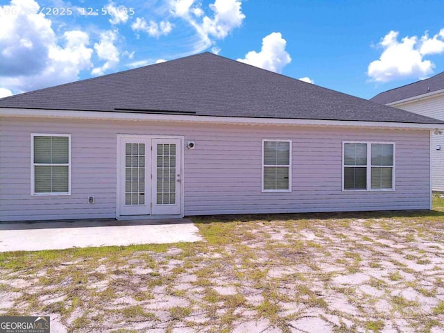 299 Mcclelland Loop NE, Ludowici, GA 31316 - back of property featuring a patio and roof with shingles