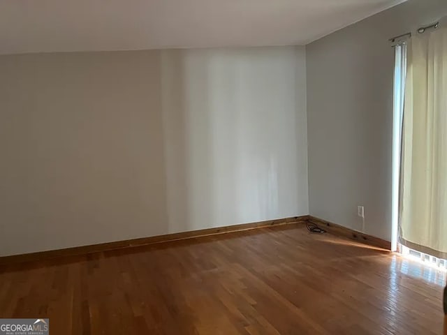 2917 Katherine Valley Rd, Decatur, GA 30032 - unfurnished room with wood finished floors and baseboards