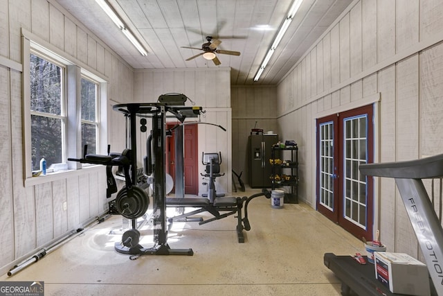 4167 Downings Creek Rd, Hayesville, NC 28904 - workout room featuring ceiling fan, french doors, and wooden walls