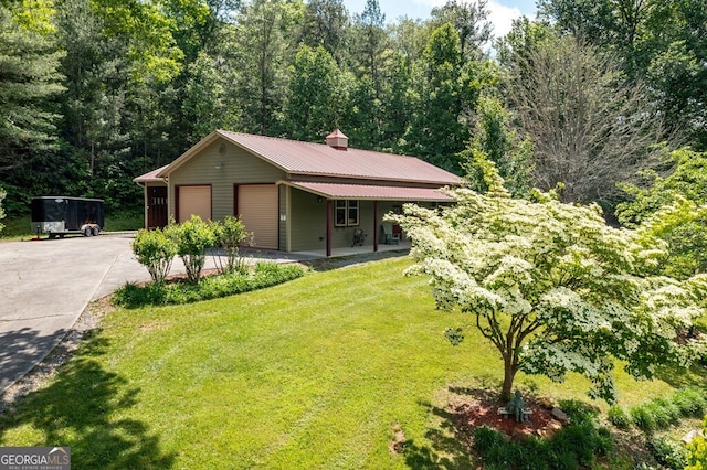 4167 Downings Creek Rd, Hayesville, NC 28904 - view of front of property with a front yard, concrete driveway, and a metal roof