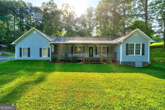 30 Red Bird Ln, Ellijay, GA 30540 - single story home featuring a porch, a front yard, and view of wooded area
