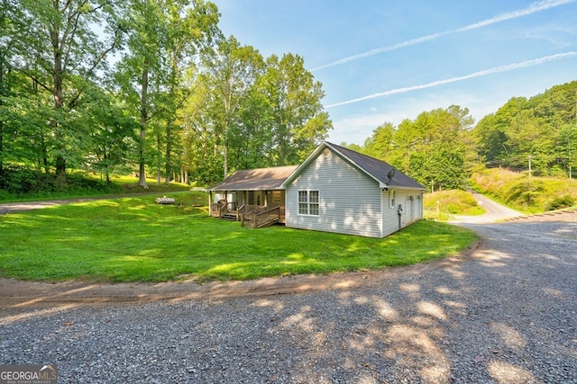 30 Red Bird Ln, Ellijay, GA 30540 - view of home's exterior with a yard and covered porch