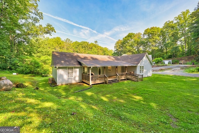 30 Red Bird Ln, Ellijay, GA 30540 - back of property with a yard and a porch