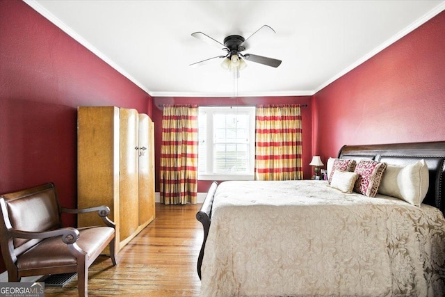 3579 Overlook Ave, Macon, GA 31204 - bedroom with crown molding, wood finished floors, and a ceiling fan