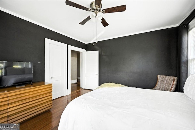 3579 Overlook Ave, Macon, GA 31204 - bedroom with wood finished floors, vaulted ceiling, crown molding, and ceiling fan