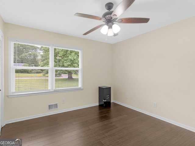 117 Thomas St, Griffin, GA 30224 - empty room featuring dark wood finished floors and ceiling fan
