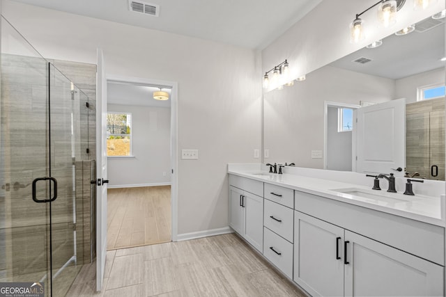 1692 Juniper Berry Way, Loganville, GA 30052 - full bathroom with double vanity and a stall shower