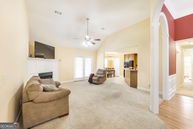 112 Huntwood Ln, Kathleen, GA 31047 - living room with ceiling fan, plenty of natural light, a fireplace, light carpet, and high vaulted ceiling