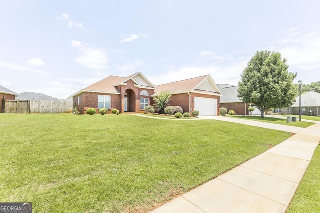 112 Huntwood Ln, Kathleen, GA 31047 - view of front of property featuring brick siding, driveway, and a garage