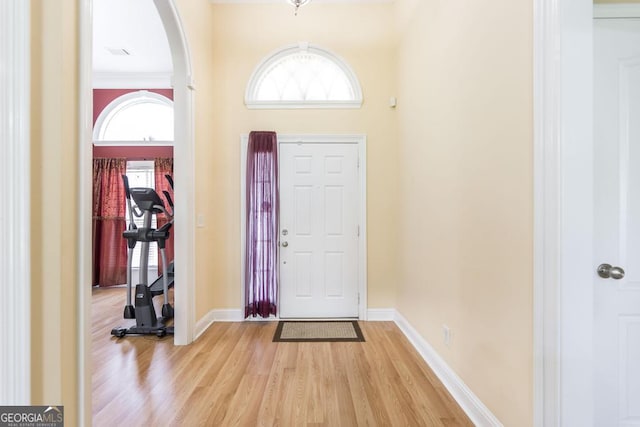 112 Huntwood Ln, Kathleen, GA 31047 - entrance foyer featuring light wood-type flooring and arched walkways