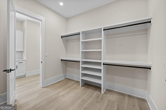 1131 Glen Eagle Dr, Greensboro, GA 30642 - spacious closet featuring light wood finished floors