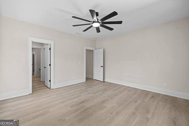 1131 Glen Eagle Dr, Greensboro, GA 30642 - unfurnished bedroom with light wood-type flooring and ceiling fan
