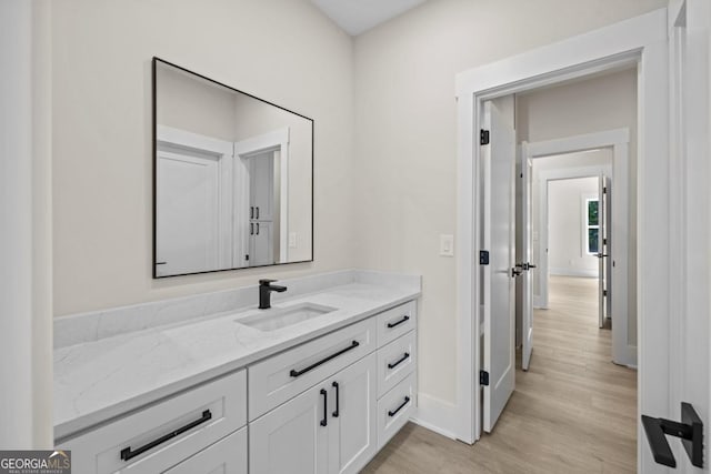1131 Glen Eagle Dr, Greensboro, GA 30642 - bathroom with vanity and wood finished floors