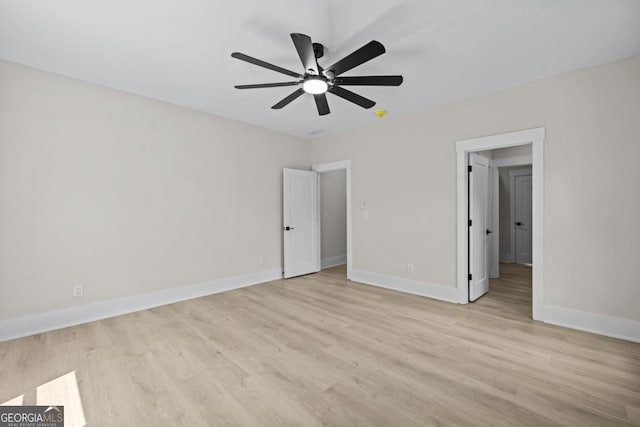 1131 Glen Eagle Dr, Greensboro, GA 30642 - unfurnished bedroom with light wood finished floors and a ceiling fan