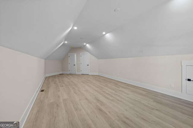 1131 Glen Eagle Dr, Greensboro, GA 30642 - additional living space featuring recessed lighting, light wood finished floors, and vaulted ceiling