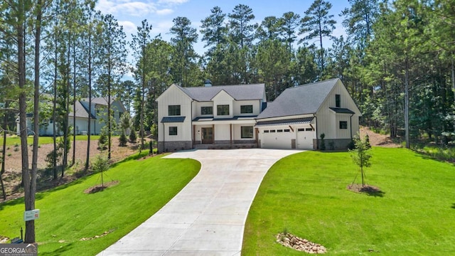 1131 Glen Eagle Dr, Greensboro, GA 30642 - modern farmhouse with board and batten siding, concrete driveway, a front yard, and an attached garage