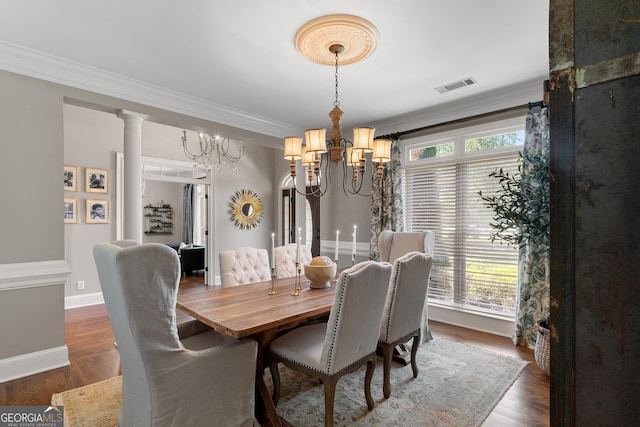 660 Milton Dr, Mcdonough, GA 30252 - dining space with a chandelier, ornamental molding, and wood finished floors
