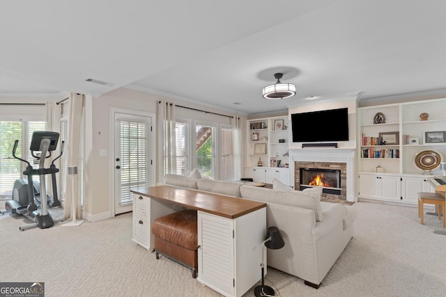 660 Milton Dr, Mcdonough, GA 30252 - living room featuring crown molding, light colored carpet, and a lit fireplace