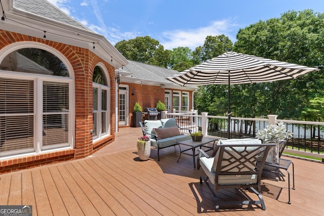 660 Milton Dr, Mcdonough, GA 30252 - wooden terrace featuring an outdoor living space and outdoor dining space