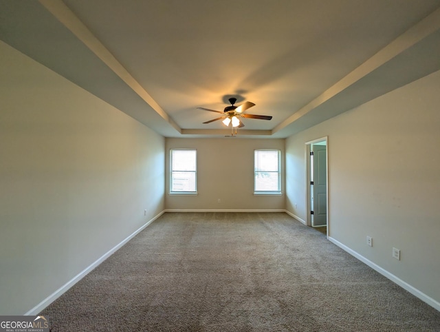 120 Magnaview Dr, Mcdonough, GA 30253 - unfurnished room with a raised ceiling, carpet, and a ceiling fan