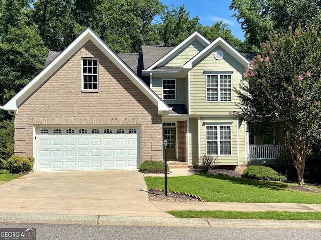 205 Huntington Shoals Dr, Athens, GA 30606 - traditional-style house featuring concrete driveway, a front lawn, a garage, and brick siding