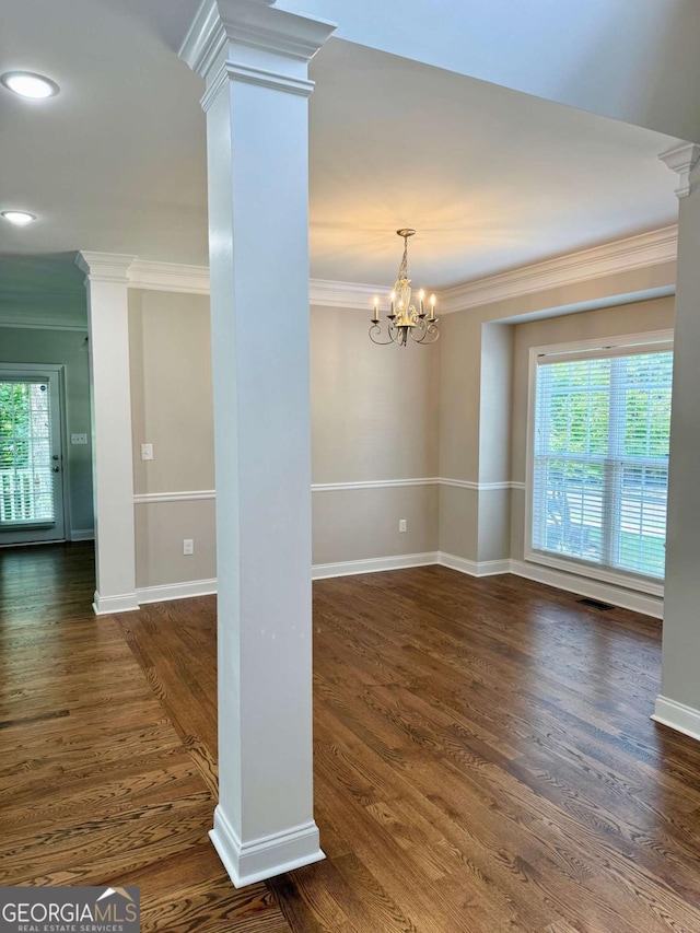 205 Huntington Shoals Dr, Athens, GA 30606 - unfurnished living room with crown molding, ornate columns, dark wood-style floors, a chandelier, and recessed lighting
