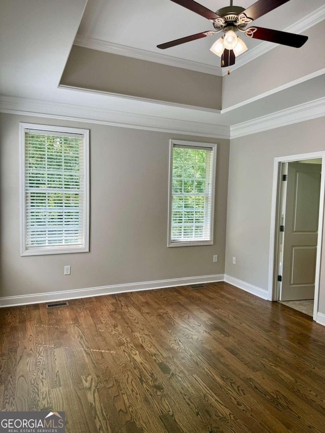 205 Huntington Shoals Dr, Athens, GA 30606 - spare room with a ceiling fan, a raised ceiling, ornamental molding, and dark wood finished floors