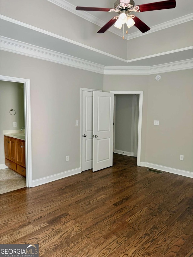 205 Huntington Shoals Dr, Athens, GA 30606 - unfurnished bedroom with wood finished floors, crown molding, connected bathroom, and a ceiling fan