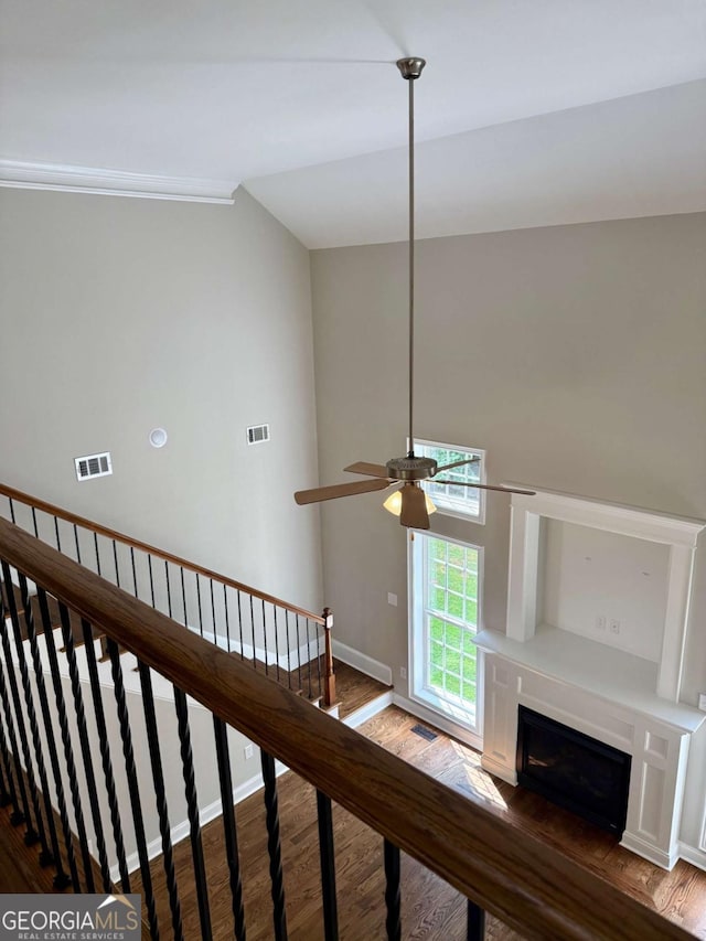 205 Huntington Shoals Dr, Athens, GA 30606 - stairway with wood finished floors, a fireplace, a ceiling fan, and lofted ceiling