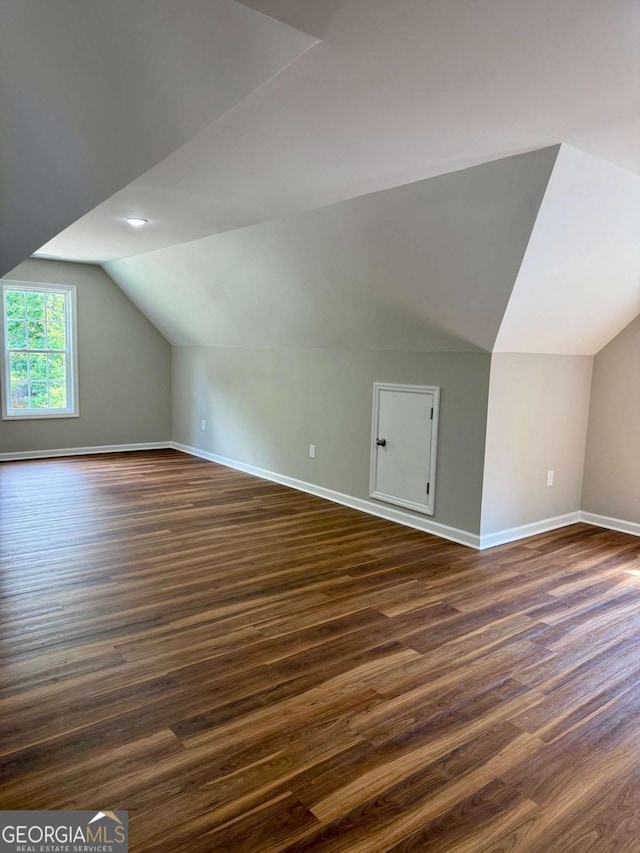 205 Huntington Shoals Dr, Athens, GA 30606 - additional living space featuring lofted ceiling and dark wood-style floors