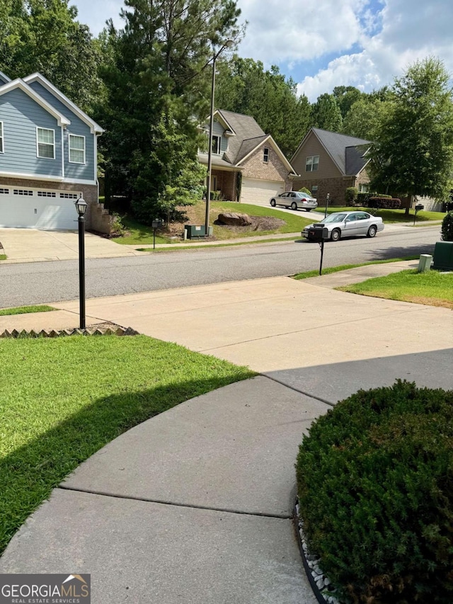 205 Huntington Shoals Dr, Athens, GA 30606 - view of grassy yard with a garage