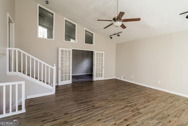 6290 Shallowford Way, Douglasville, GA 30135 - spare room featuring french doors, dark wood-type flooring, a ceiling fan, rail lighting, and lofted ceiling