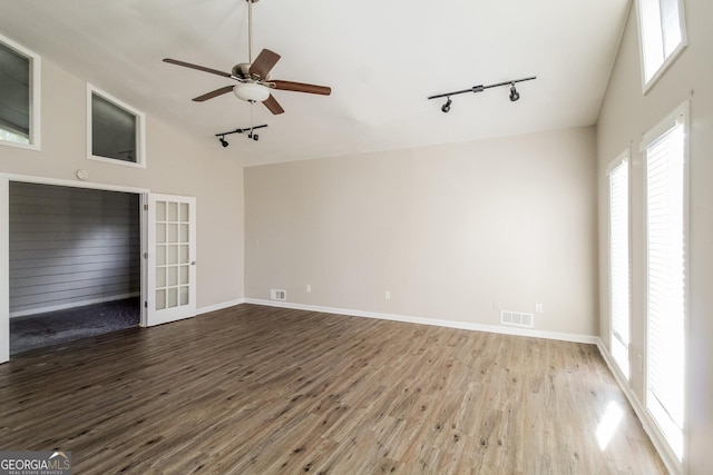 6290 Shallowford Way, Douglasville, GA 30135 - spare room with track lighting, wood finished floors, french doors, a ceiling fan, and high vaulted ceiling