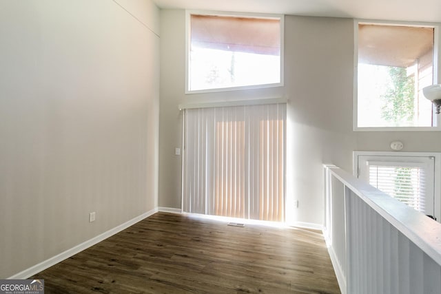 6290 Shallowford Way, Douglasville, GA 30135 - unfurnished living room with dark wood-type flooring and a high ceiling
