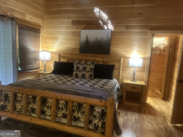 105 Ranch Mountain Ct, Dahlonega, GA 30533 - bedroom featuring wood-type flooring and wooden walls