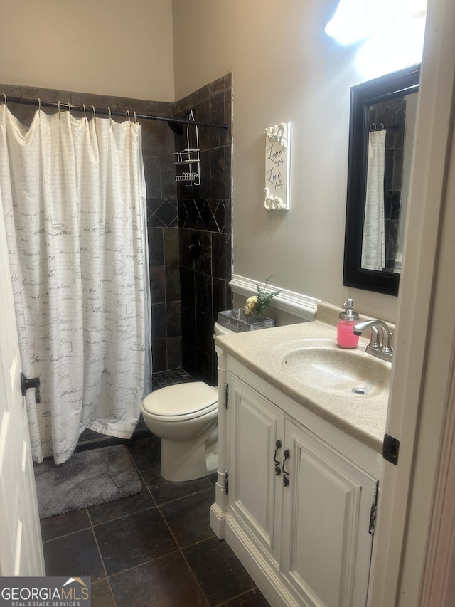 105 Ranch Mountain Ct, Dahlonega, GA 30533 - bathroom featuring vanity, tiled shower, and tile patterned flooring
