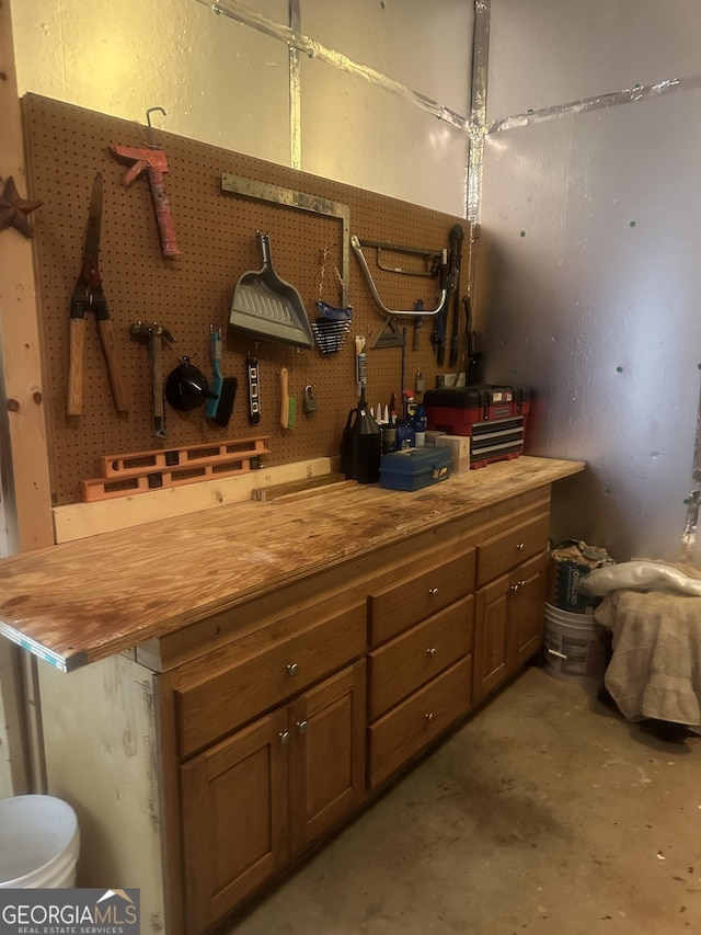 105 Ranch Mountain Ct, Dahlonega, GA 30533 - bathroom featuring a workshop area, concrete flooring, and vanity