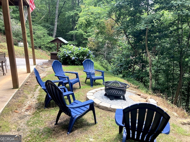 105 Ranch Mountain Ct, Dahlonega, GA 30533 - view of yard featuring a fire pit, a view of trees, and a patio