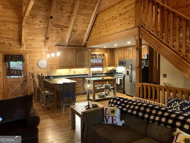 105 Ranch Mountain Ct, Dahlonega, GA 30533 - living area with light wood-style flooring, wooden walls, and wood ceiling