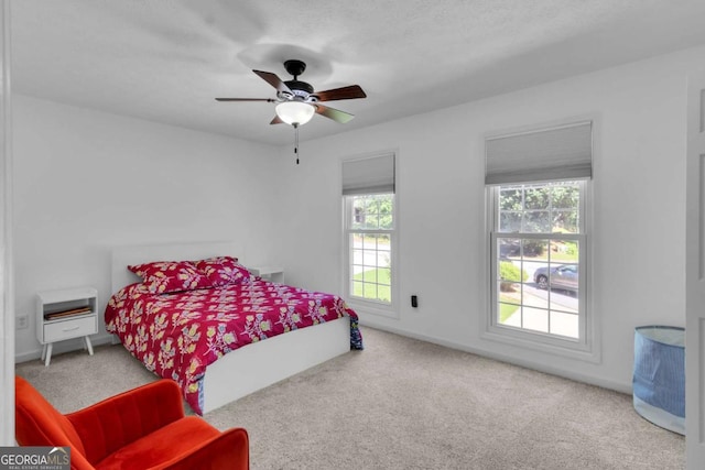 1481 Howard Way, Lawrenceville, GA 30043 - carpeted bedroom featuring baseboards and ceiling fan