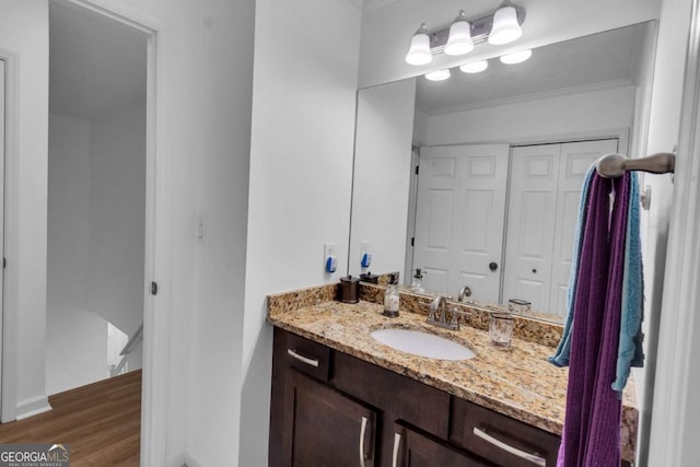 1481 Howard Way, Lawrenceville, GA 30043 - bathroom with vanity, crown molding, and wood finished floors