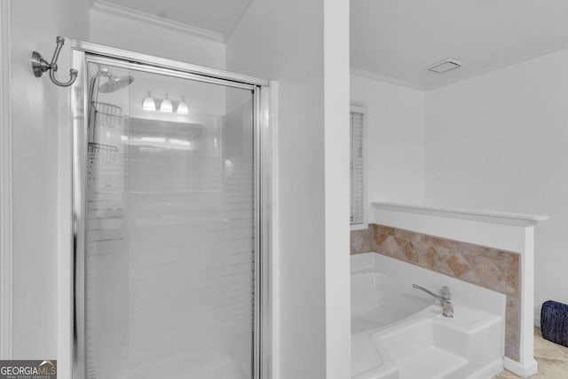 1481 Howard Way, Lawrenceville, GA 30043 - bathroom with a stall shower, a garden tub, and ornamental molding