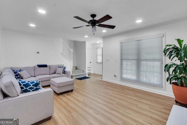 1481 Howard Way, Lawrenceville, GA 30043 - living area featuring stairway, recessed lighting, light wood-style floors, and a ceiling fan