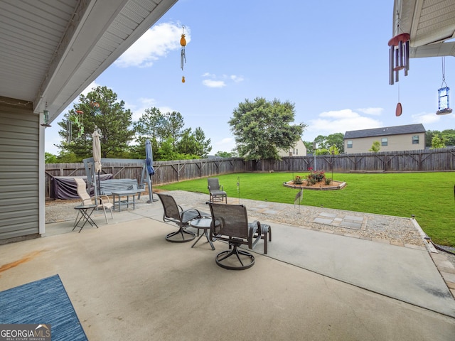 1804 Maxey Ln, Winder, GA 30680 - fenced backyard with a patio