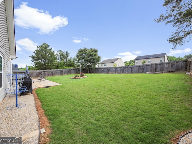 1804 Maxey Ln, Winder, GA 30680 - fenced backyard with a patio