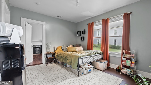 424 Cedar Ave SW, Rome, GA 30161 - bedroom with wood finished floors and multiple windows