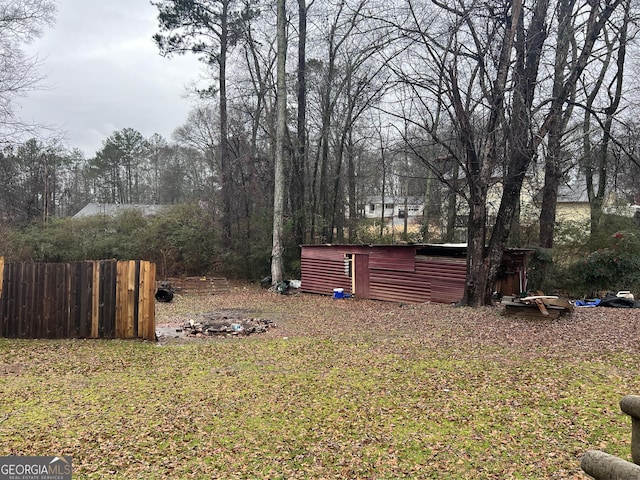 643 Dailey Mill Rd, Mcdonough, GA 30253 - view of yard with a storage unit
