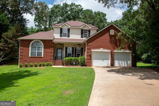 214 Hunters Chase, Byron, GA 31008 - traditional home featuring concrete driveway, brick siding, a front lawn, and a ceiling fan