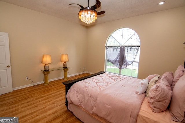 214 Hunters Chase, Byron, GA 31008 - bedroom featuring multiple windows, wood finished floors, and recessed lighting